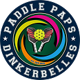 Circular logo with the text 'Paddle Paps Dinkerbelles' surrounding a colorful design of a paddle, a flower, and water.